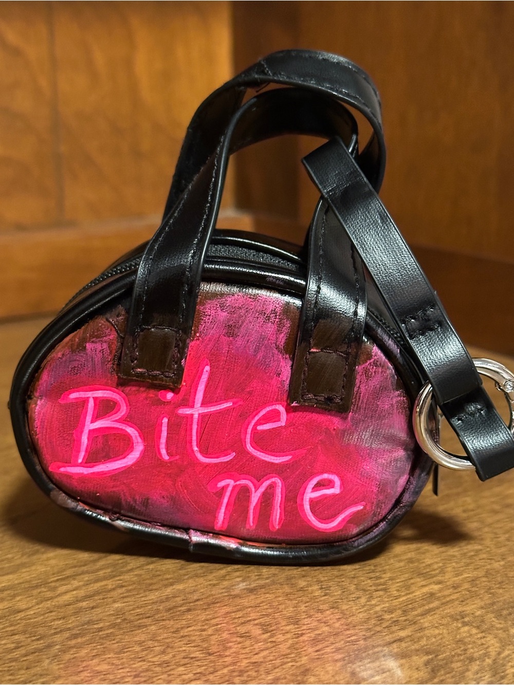 Hand Painted Black Mini bag charm with Pink 'Bite Me' Graphic